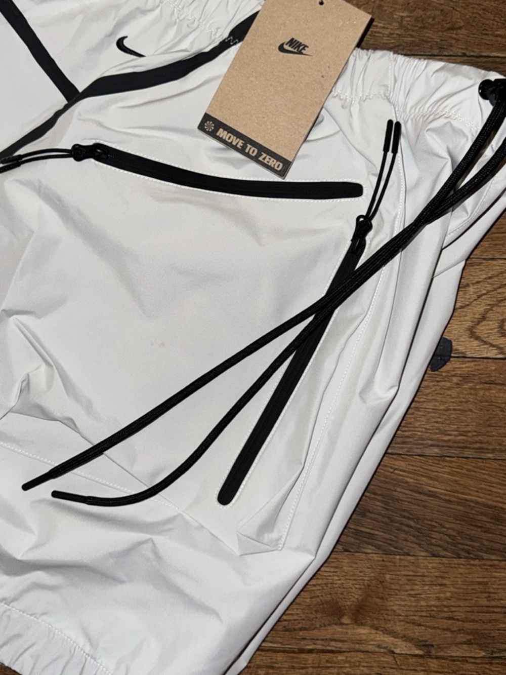 Nike White Athletic Shorts with Black Zipper Accents - Picture 5 of 6